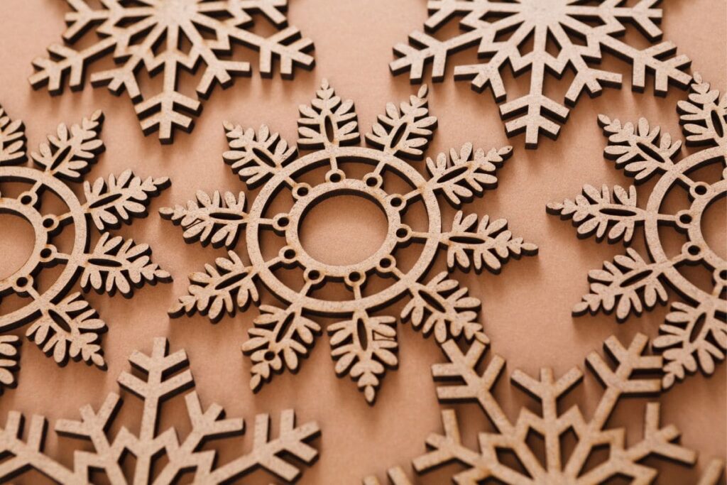 Laser-cut snowflake Christmas decorations.