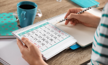 Woman researching the best work from home jobs for 2024 while drinking coffee