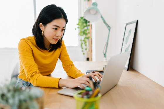 Young Asian woman working from home at her low-stress job